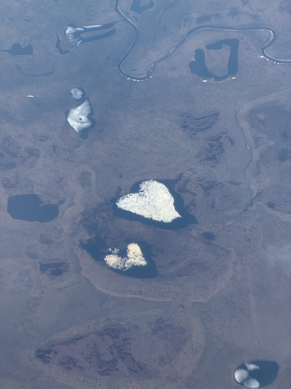 Above northern Alaska, US. Shot on iPhone 16 Pro.